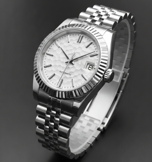 The Artisan Watch, featuring a white textured dial in a 36mm stainless steel case